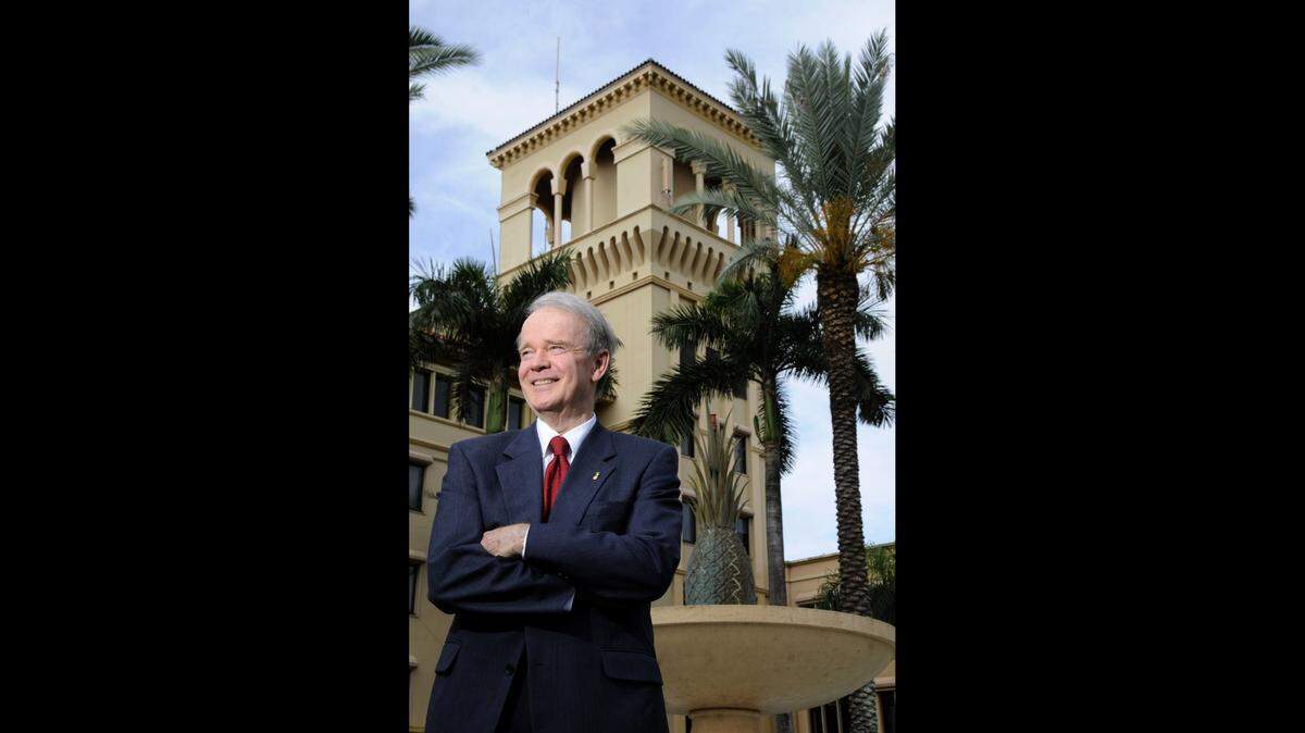 In this 2012 Miami Herald photo, Brian E. Keeley, president and CEO of Baptist Health, stands in front of Baptist Hospital, 8900 North Kendall Dr.