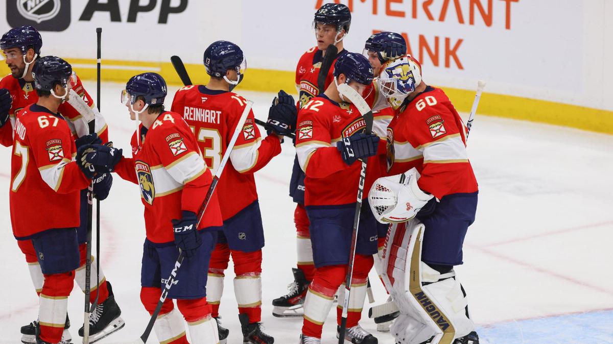 Florida Panthers goaltender Chris Driedger (60) celebrates with defenseman Gustav Forsling (42) after a NHL preseason game against the Nashville Predators at Amerant Bank Arena in Sunrise, Florida, on Sunday, September 22, 2024.
