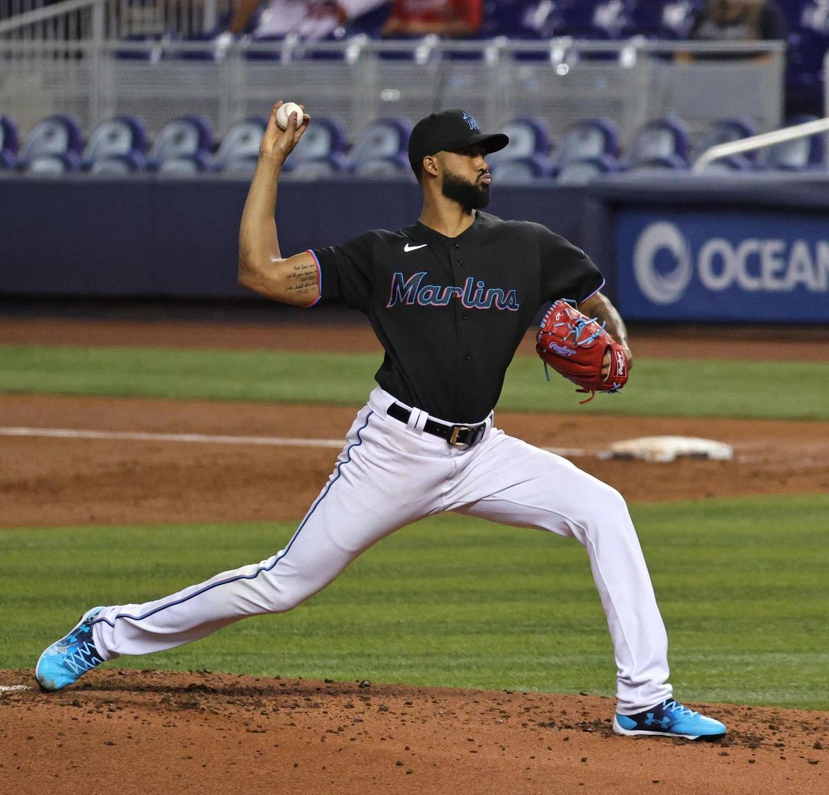 Miami Marlins pitcher Sandy Alcantara (22) pitches against the Atlanta Braves during the second inning of their baseball game at loanDepot park on Friday, June 11, 2021 in Miami, Florida.