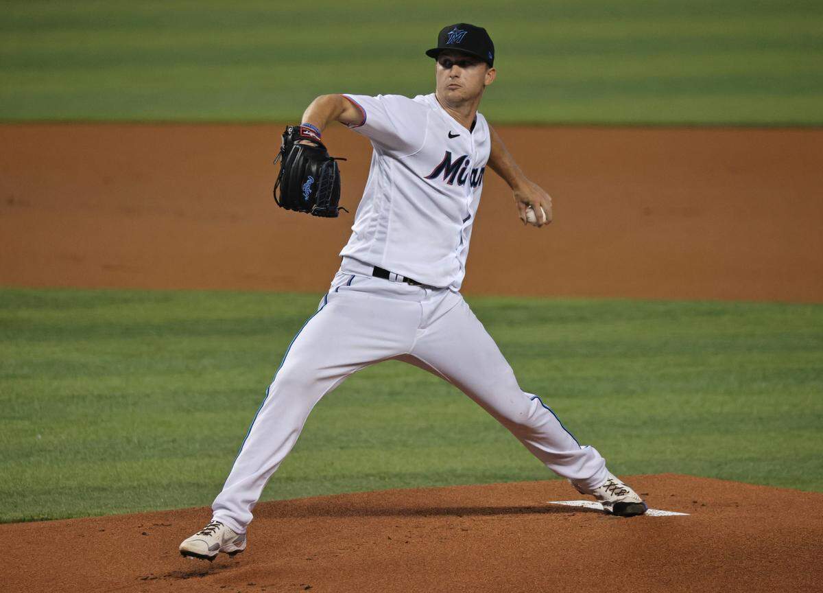 Miami Marlins pitcher Braxton Garrett (60) pitches against the Colorado Rockies during the first inning of their baseball game at loanDepot park on Wednesday, June 9, 2021 in Miami, Florida.