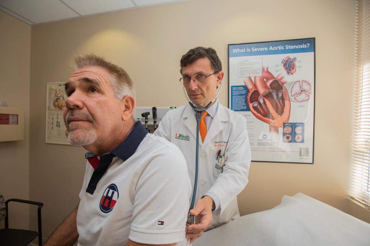Dr. Mauricio Cohen and his patient, Eusebio Gamito, who has had three heart attacks, at UHealth Tower.