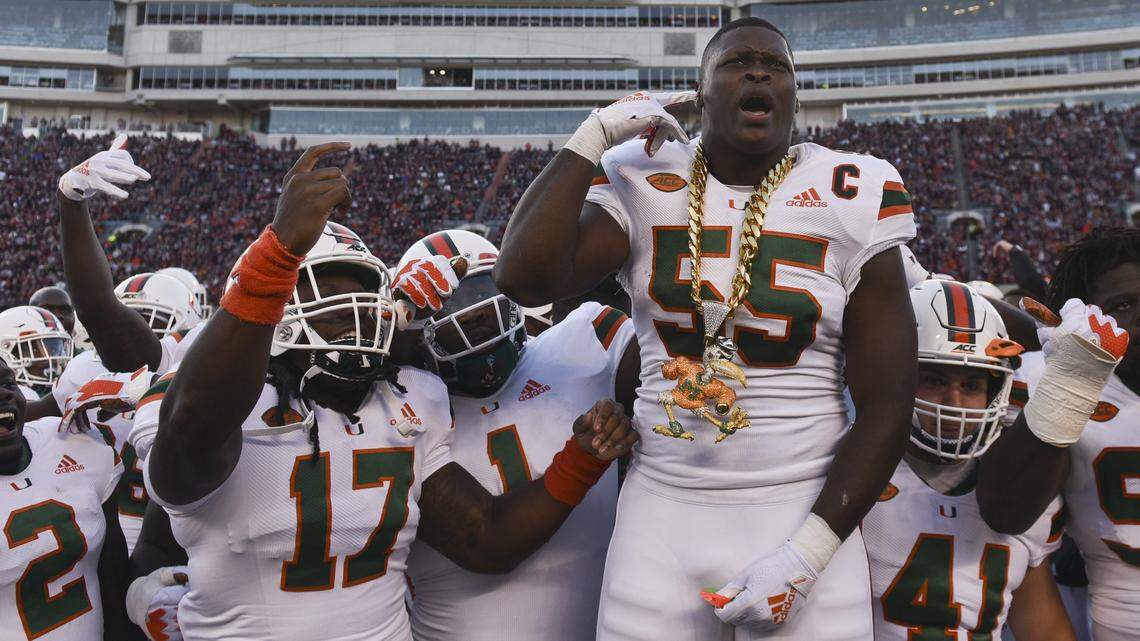 Miami Hurricanes linebacker Shaquille Quarterman (55) celebrates his interception against the Virginia Tech Hokies in the first half at Lane Stadium on Nov. 17, 2018 in Blacksburg, Va.