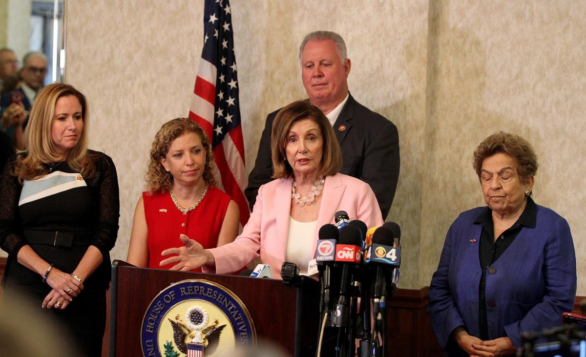 House Speaker Nancy Pelosi speaks flanked by Reps. Debbie Mucarsel-Powell, Debbie Wasserman Schultz, Albio Sires, and Donna Shalala. She attended a meeting in Weston to discuss peacefully transitioning to democracy in Venezuela with Ambassador Carlos Vecchio and local Venezuelan community leaders, on Thursday, October 3, 2019.