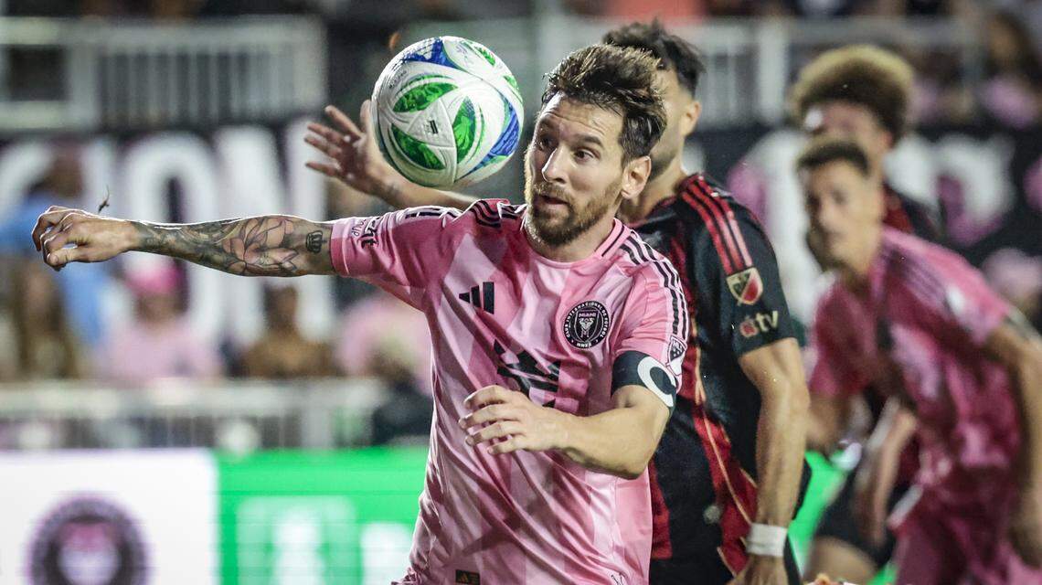 Inter Miami forward Lionel Messi (10) battles Atlanta United defenders in the second half at Chase Stadium, Fort Lauderdale, FL, on Saturday, October 11, 2025.
