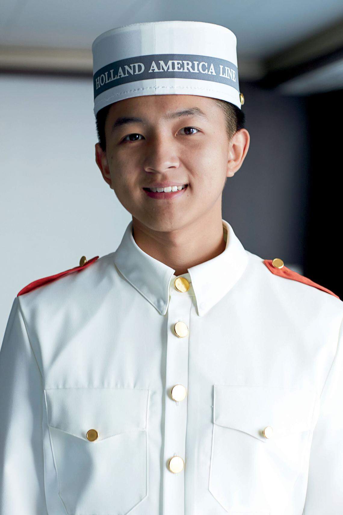 Some Holland America crew wear uniforms recalling the line’s history as Dutch line sailing East India.