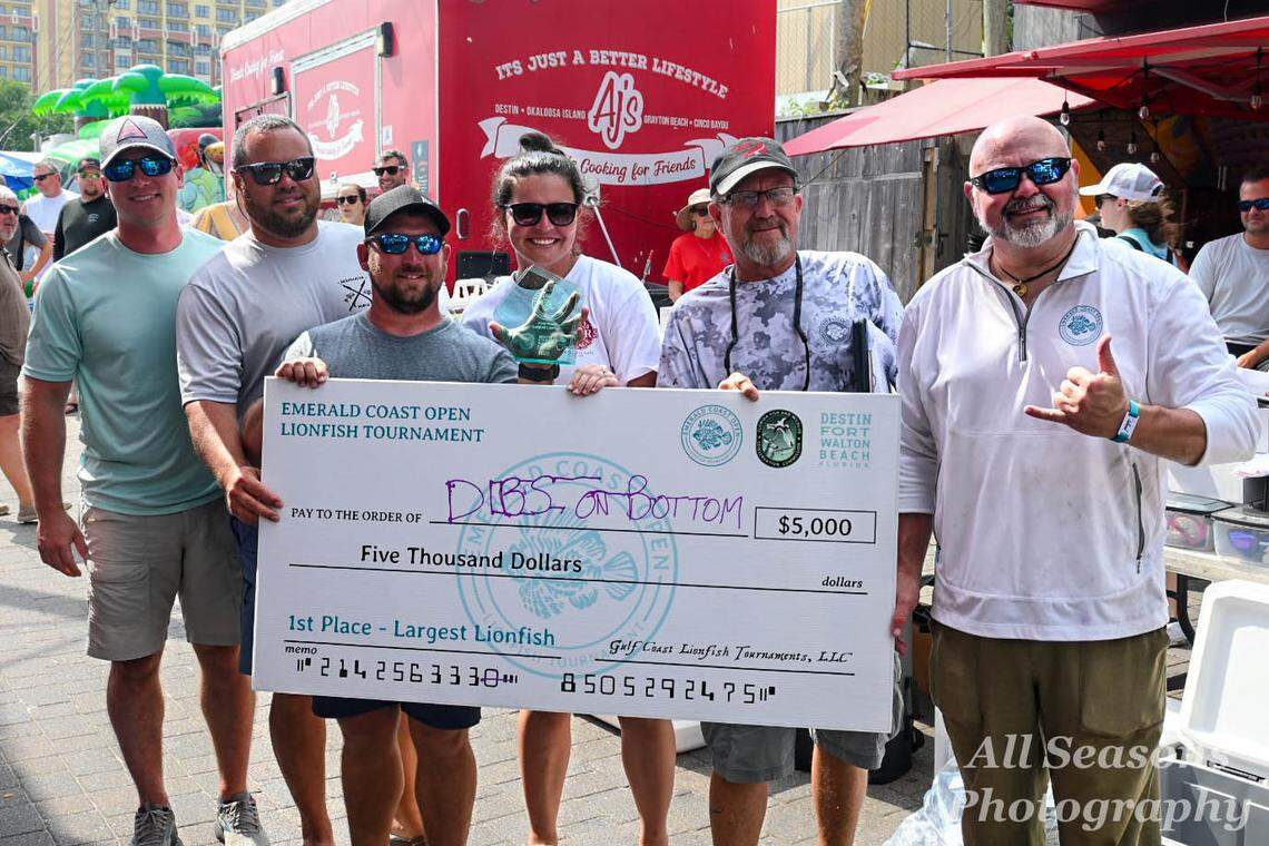 The Dibs on Bottom dive team won $5,000 in the tournament and is credited with getting the largest lionfish.