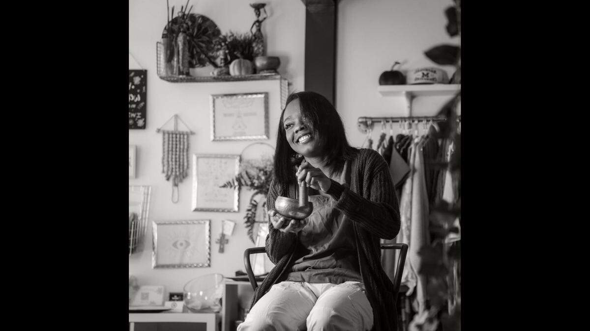 Dominique Guirand, a 24-year-old doula and owner of Flourished Spa and Wellness Center, has created a space where pregnant women and mothers can receive maternity care in North Miami Beach. Guirand is photographed at her business, where she feels the empowerment of her Blackness.