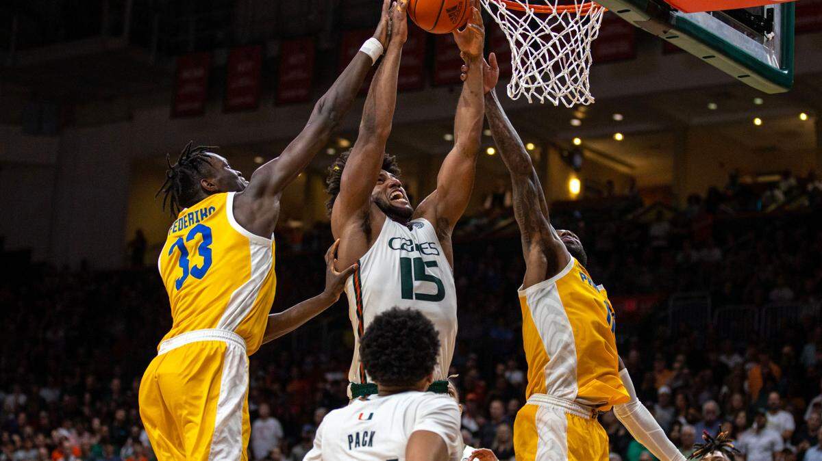 Hurricanes forward Norchad Omier (15) fighting for a rebound against Pitt earlier this season, is a rebounding machine who will play a big role against No. 1 seed Houston in the Sweet 16 on Friday.