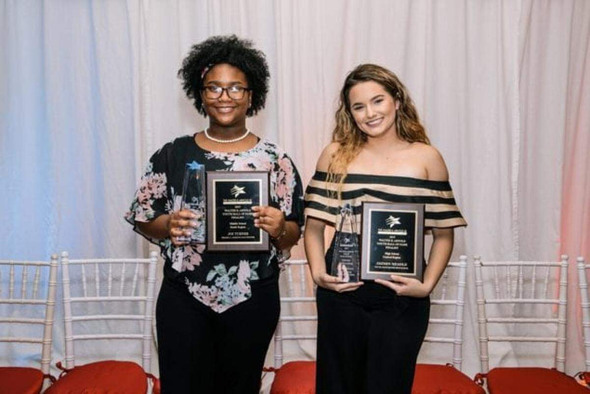 Joi Turner from Frank C. Martin K-8 Center, left, and Jazmin Neadle from South Miami High School, right, were named winners of The Miami-Dade County Youth Fair and Exposition’s 2019 Walter B. Arnold Youth Hall of Fame Community Service Award. Both students were awarded with $1,000 to celebrate their efforts to help others in their community.