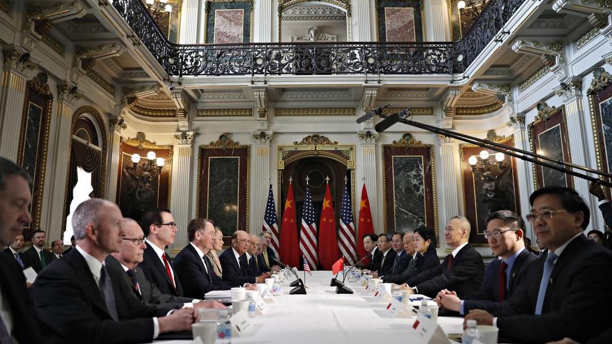 U.S. and Chinese delegations meet in the Indian Treaty Room in the Eisenhower Executive Office Building on the White House complex, during continuing meetings on the U.S.-China bilateral trade relationship on Thursday, Feb. 21, 2019, in Washington. Chinese Vice Premier Liu He, third from right, sits across the table from the U.S. delegation including the president’s Assistant for Economic Policy Larry Kudlow, third from left; Secretary of the Treasury Steven Mnuchin; U.S. Trade Representative Amb. Robert Lighthizer; Secretary of Commerce Wilbur Ross, seventh from left; and the president’s Assistant for Trade and Manufacturing Policy Peter Navarro.