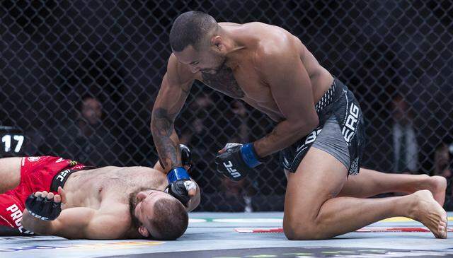 Carlos Ulberg of New Zealand knocks out Jiří Procházka of Czechia in their light heavyweight title bout at UFC 327 at the Kaseya Center on Saturday, April 11, 2026, in downtown Miami, Fla.