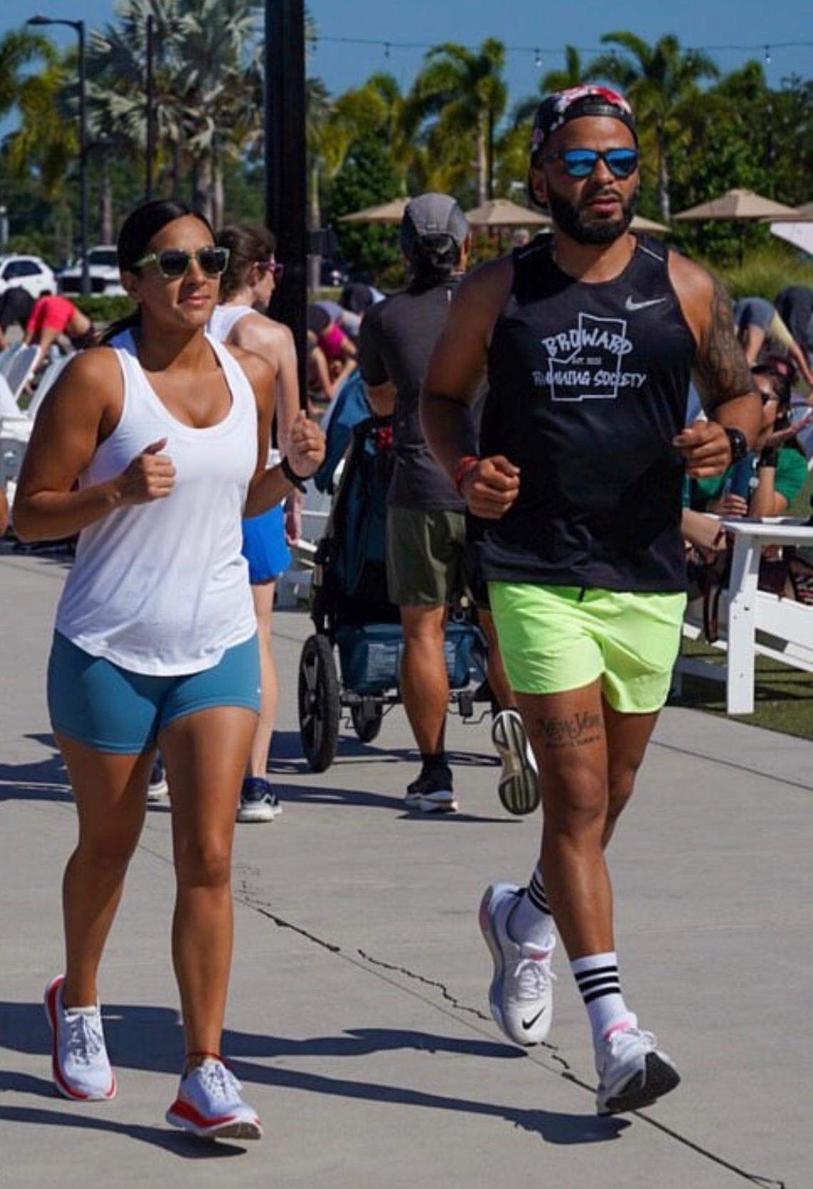 Elvis Manzanillo and Kat Pena met at the start line of the 2022 Miami Marathon. It was love at first sight.
