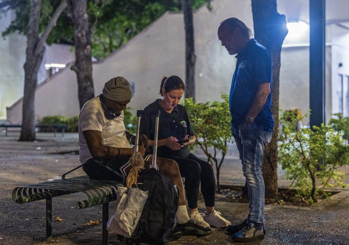 Homeless Trust Chairman Ron Book and Executive Director Vicki Mallette talk with Leroy Walker, 56, during the Trust’s biannual Homeless Census, on Thursday, August 21, 2025 in Miami, Fla.