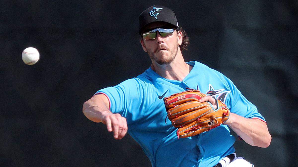 Miami Marlins third baseman Brian Anderson (15) throws during drills at spring training at the Roger Dean Chevrolet Stadium in Jupiter on Tuesday, February 23, 2021.