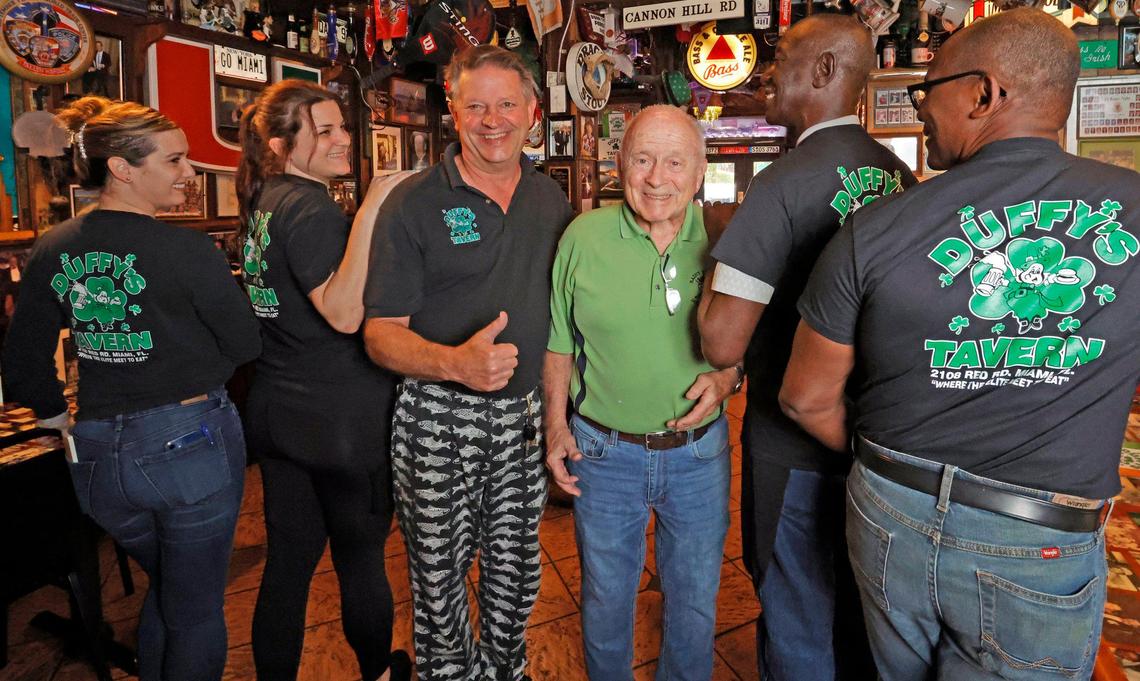 Part of the staff at Duffy’s Tavern, from left: Daylis Martinez, Gina Santibanez, owner Wayne Russell, Jim Fab, Calvin McFadden and Joanel Gardin.