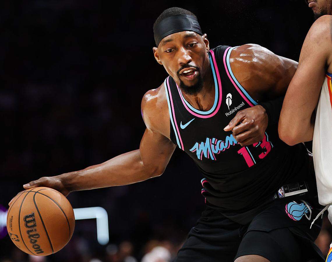 Bam Adebayo #13 of the Miami Heat controls the ball against the Oklahoma City Thunder during the first half at Kaseya Center on January 17, 2026 in Miami.