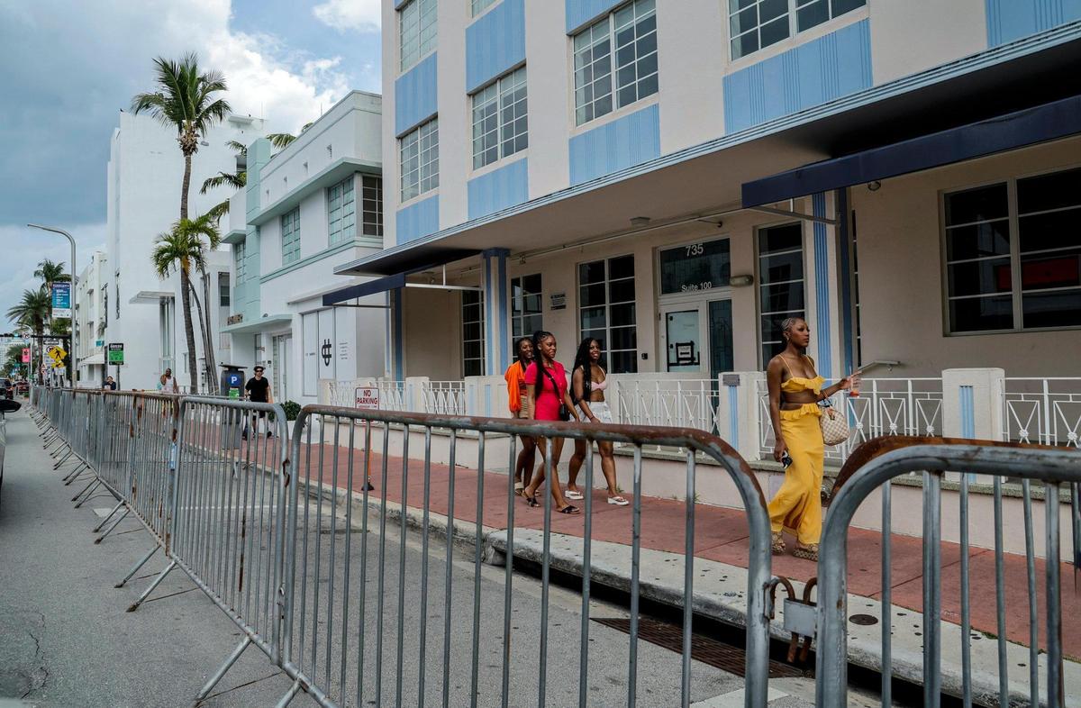 Street parking spots along Washington Avenue are barricaded during spring break. Most public parking garages and lots south of 42nd Street will be entirely closed this weekend in Miami Beach, Florida.