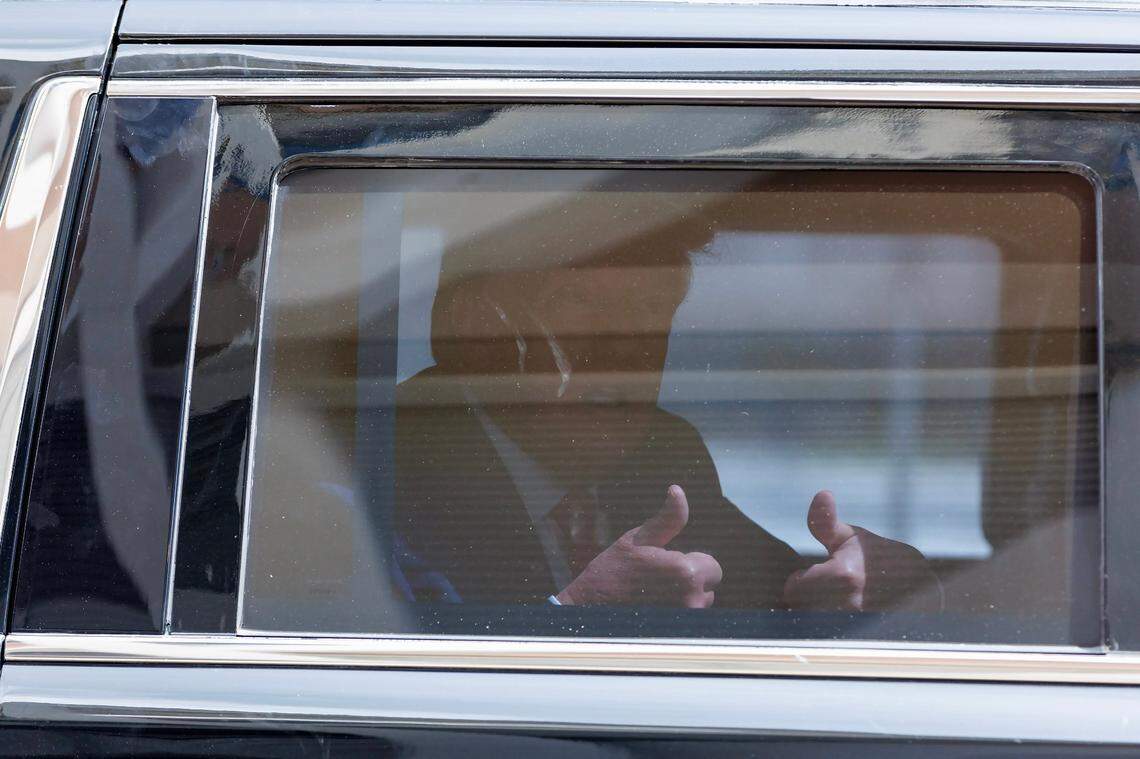 Former President Donald Trump gives a thumbs up to supporters after leaving the Wilkie D. Ferguson Jr. U.S. Courthouse, Tuesday, June 13, 2023, in Miami, after his arraignment.