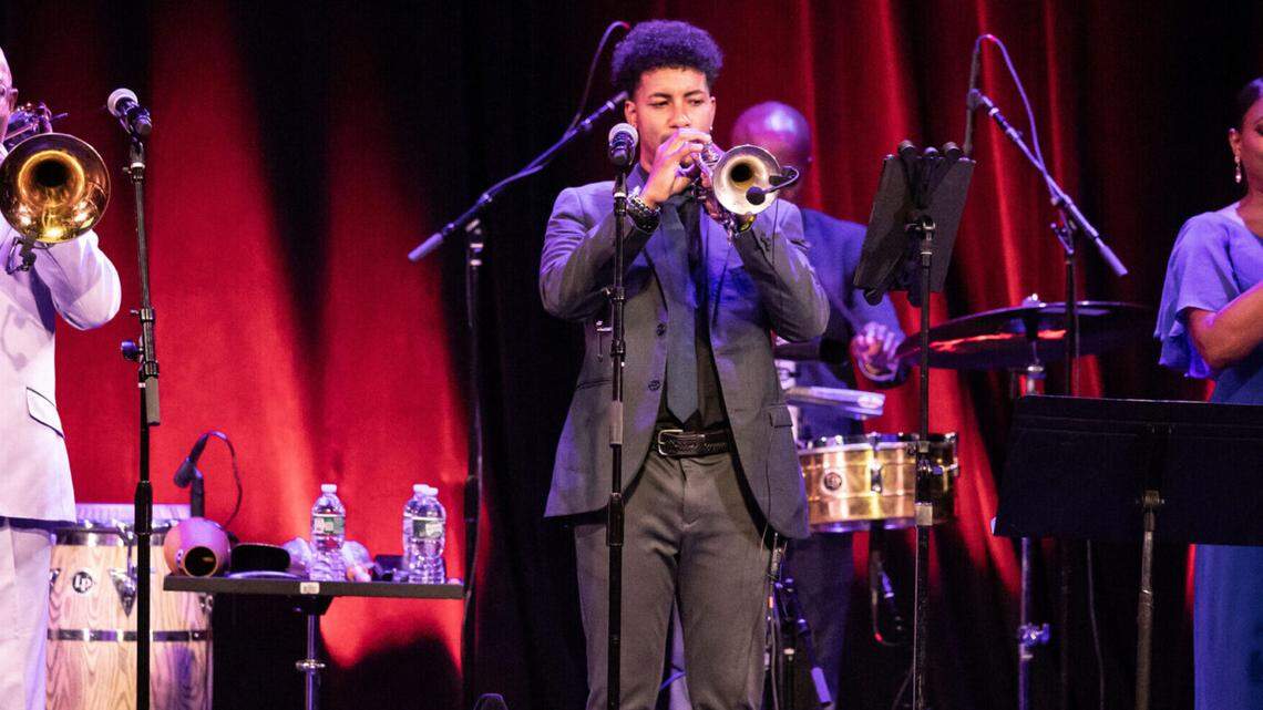 Musical director Jesús “Aguaje” Ramos and his Buena Vista Orchestra, left, seen here in a September performance at New York’s Town Hall, will be playing at the Miami Beach Bandshell on Saturday, Oct. 19.