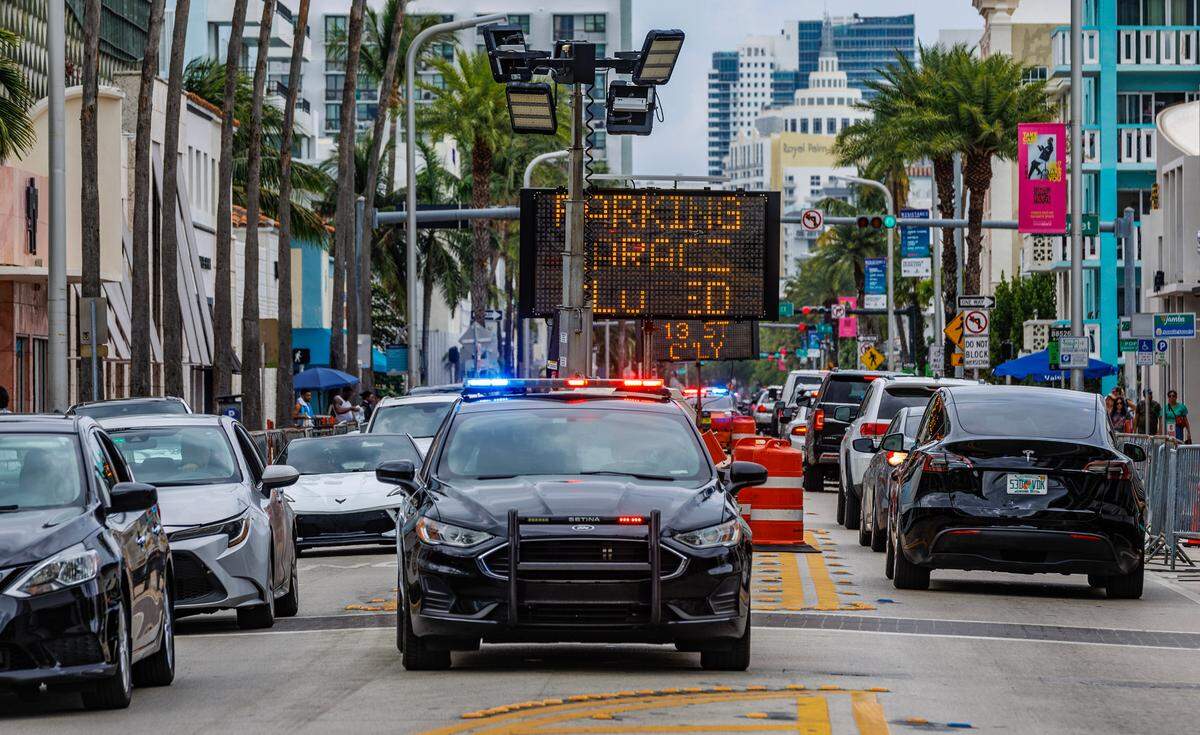 A police car from the Miami Dade Public Schools parked on on Collins Avenue near 7th Street - part of the show of force during spring break in Miami Beach..