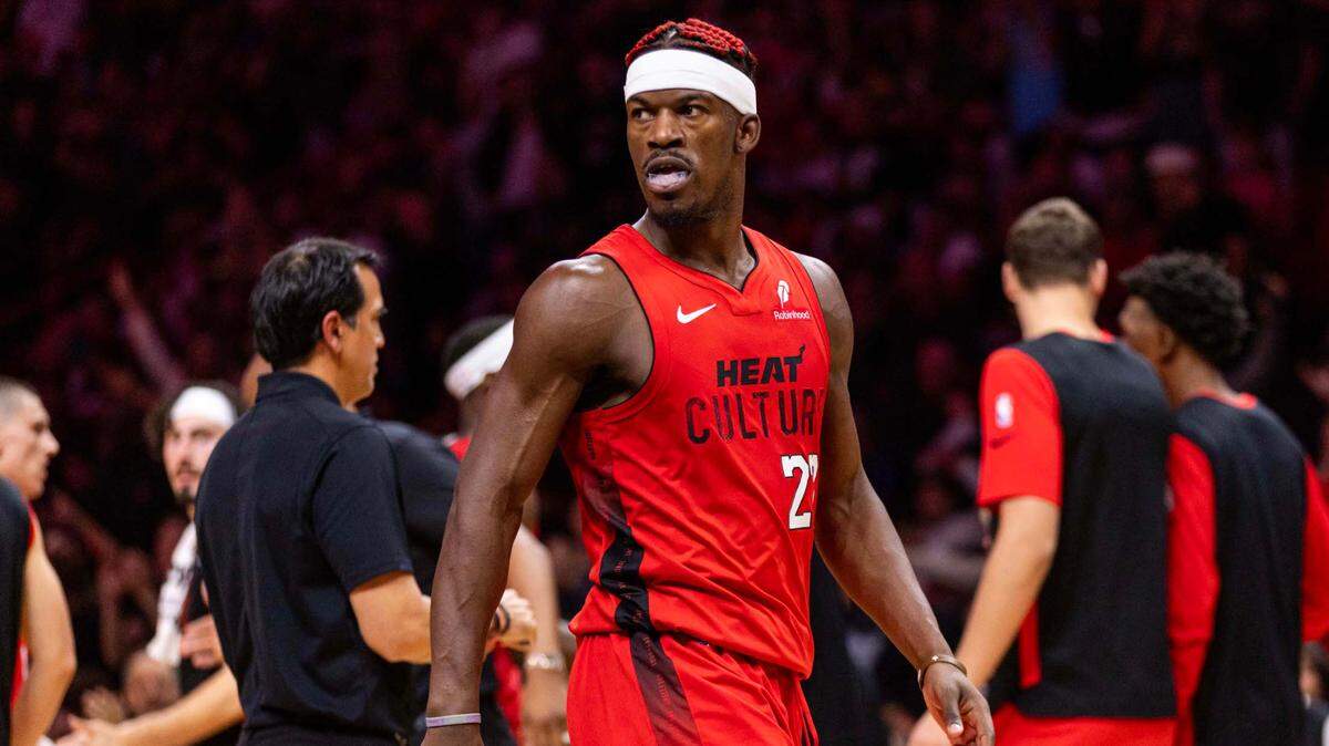 Miami Heat forward Jimmy Butler (22) reacts to scoring during the second half of an NBA game against the Dallas Mavericks at Kaseya Center on Sunday, Nov. 24, 2024, in Miami.