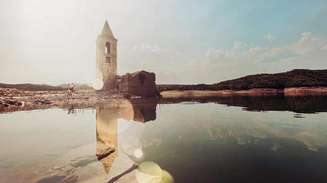 The Church of Sant Romà de Sau usually sits underwater in a reservoir in Spain, but drought in Europe has exposed more ruins than the 11th century bell tower.