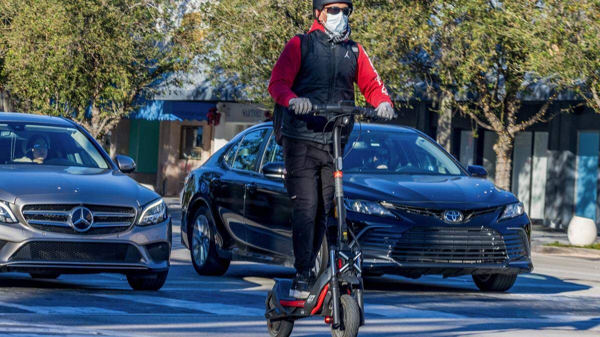 The cold temperatures didn't stop a man from riding his scooter along Miracle Mile in Coral Gables, as Miami woke to one of its coldest New Year's Eves in decades, on Wednesday, December 31, 2025.