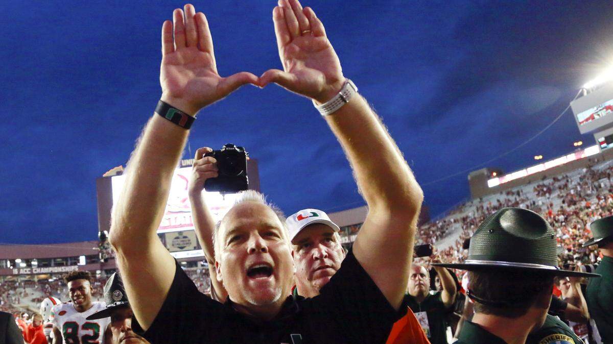 Miami Hurricanes coach Mark Richt celebrates after defeating Florida State 24-20 in Tallahassee last October. The new season of even higher expectations begins Sunday night versus LSU in Arlington, Texas.