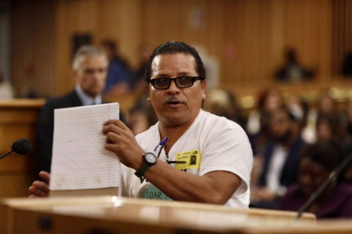 Jose Rene Martinez addresses Miami-Dade County commissioners during a budget hearing on Thursday, Sept. 5, 2024. His voice was one of many urging help for trailer-park residents having to move for a new development in Miami.
