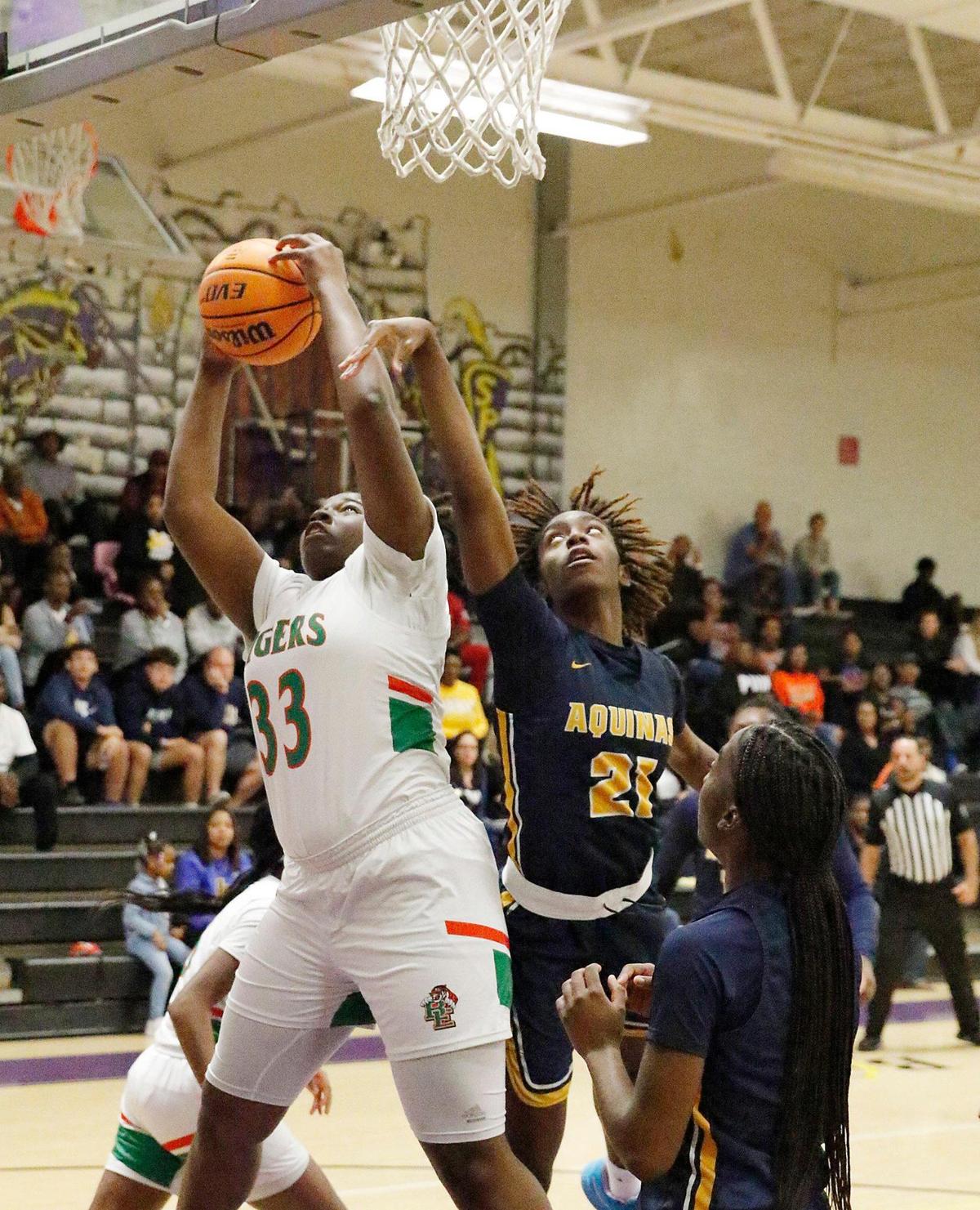 St. Thomas Aquinas Raiders Nyla McFadden (21) attempts to block a shot by Blanche Ely Tigers Laketrice Peterson (33) during the BCAA Big 8 Girls’ 2023 Basketball championship game on Saturday, January 28, 2023 at South Plantation HS in Plantation. Andrew Uloza / for Miami Herald