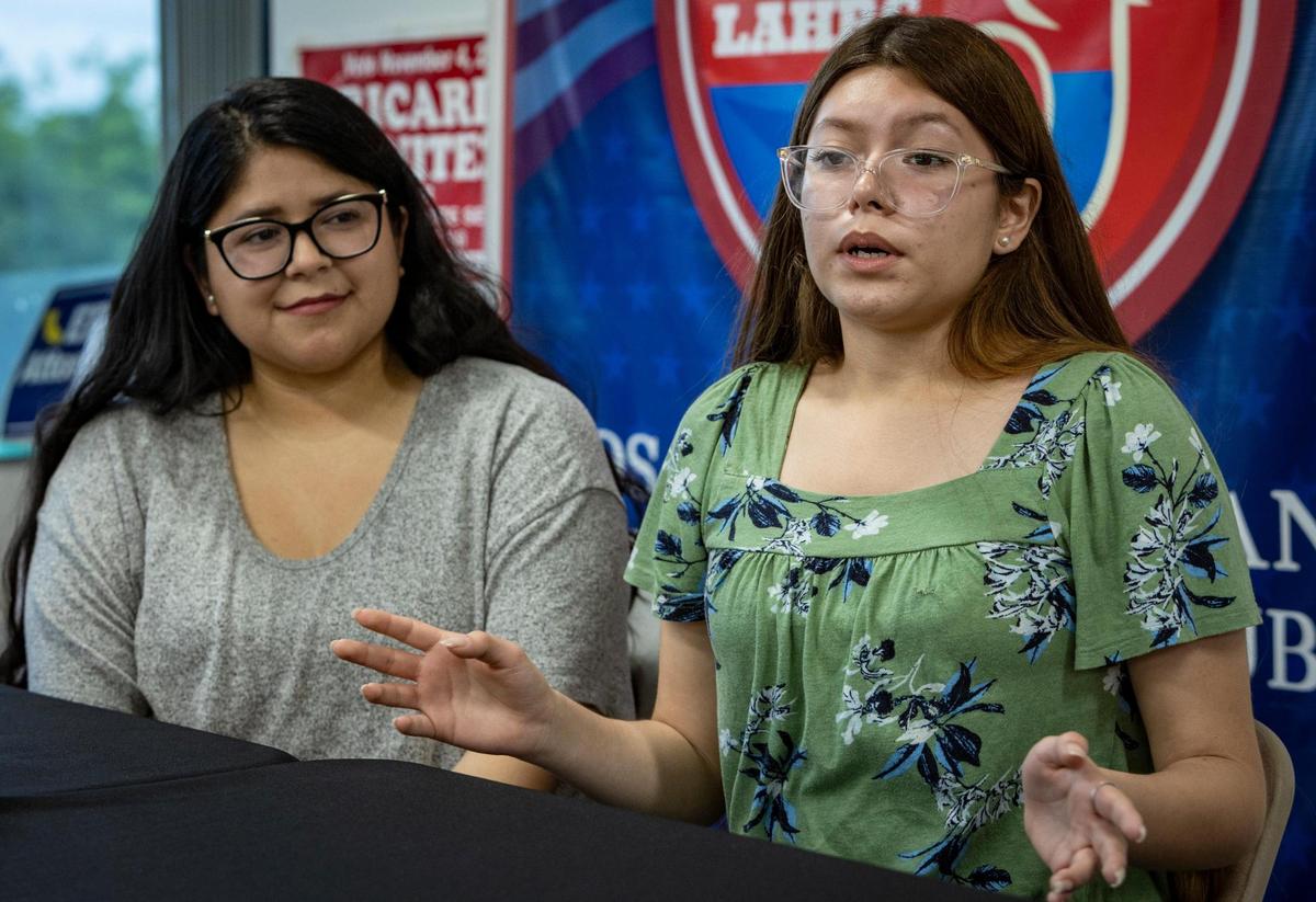 Katherine Santana, left, and her daughter, Elizabeth Santana-Zavala, talk to journalists at the offices of the Los Angeles Hispanic Republican Club.