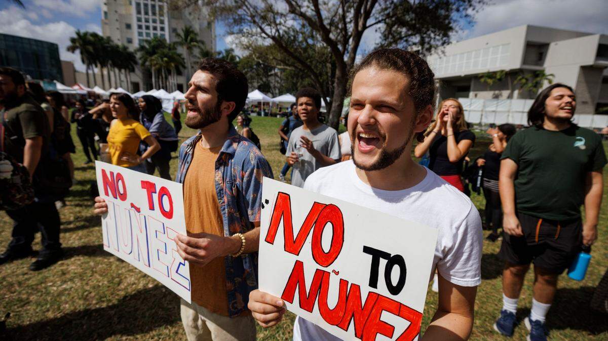 Chris, right, and other protesters chant “Lieutenant Nuñez has got to go!” during a protest against the appointment of Lt. Governor Jeanette Nuñez as interim president of FIU on Thursday, Feb. 13, 2025, at Florida International University main campus in Miami, Fla. Around 150 people chant “We do not consent to FIU’s new president!”