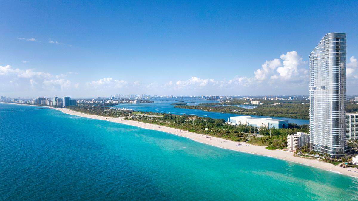 A photograph of the completed Ritz-Carlton Residences, Sunny Isles Beach is shown above.