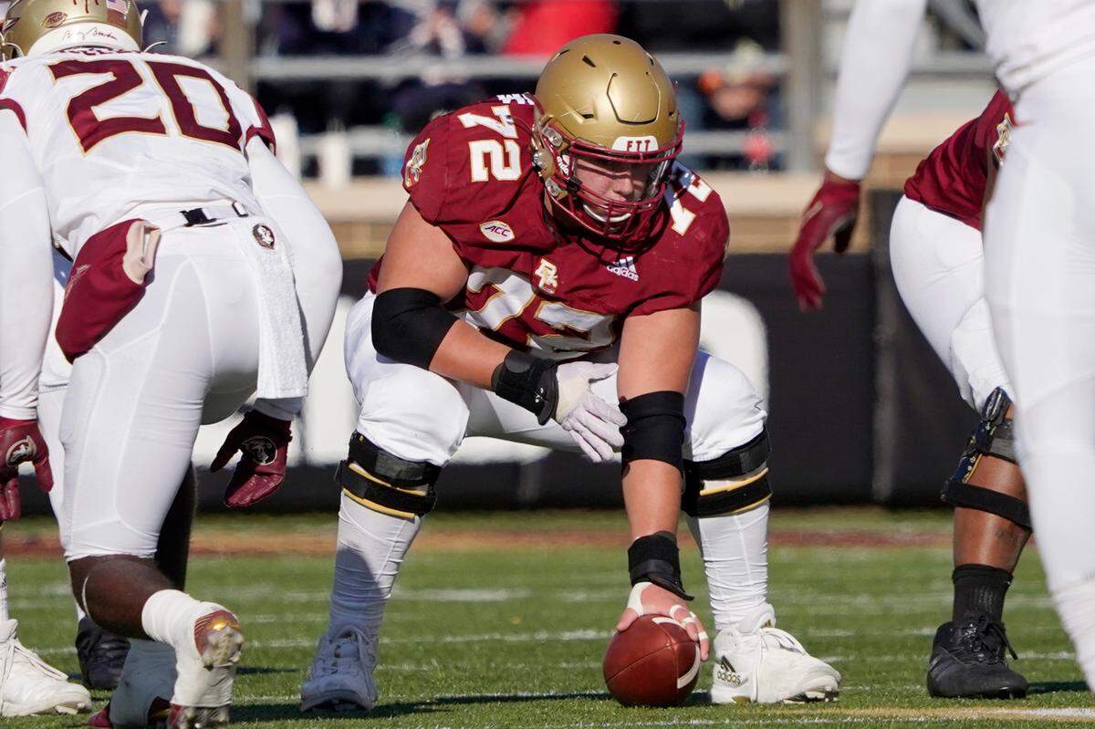 Boston College offensive lineman Alec Lindstrom (72) prepares to snap the ball during the first half of an NCAA college football game against Florida State, Saturday, Nov. 20, 2021, in Boston. (AP Photo/Mary Schwalm)