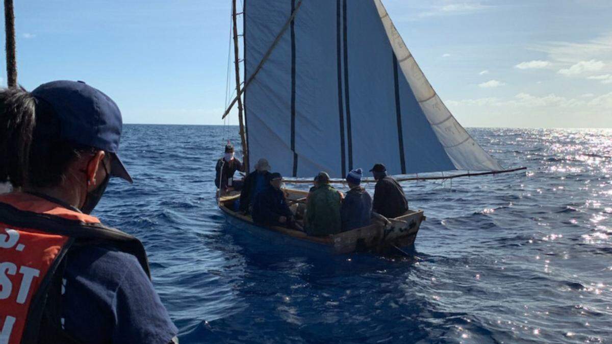 A Coast Guard Station Islamorada law enforcement crew stops a migrant boat with seven people from Cuba onboard last Tuesday, March 2, 2021. A Coast Guard cutter returned the people to Cuba three days later.