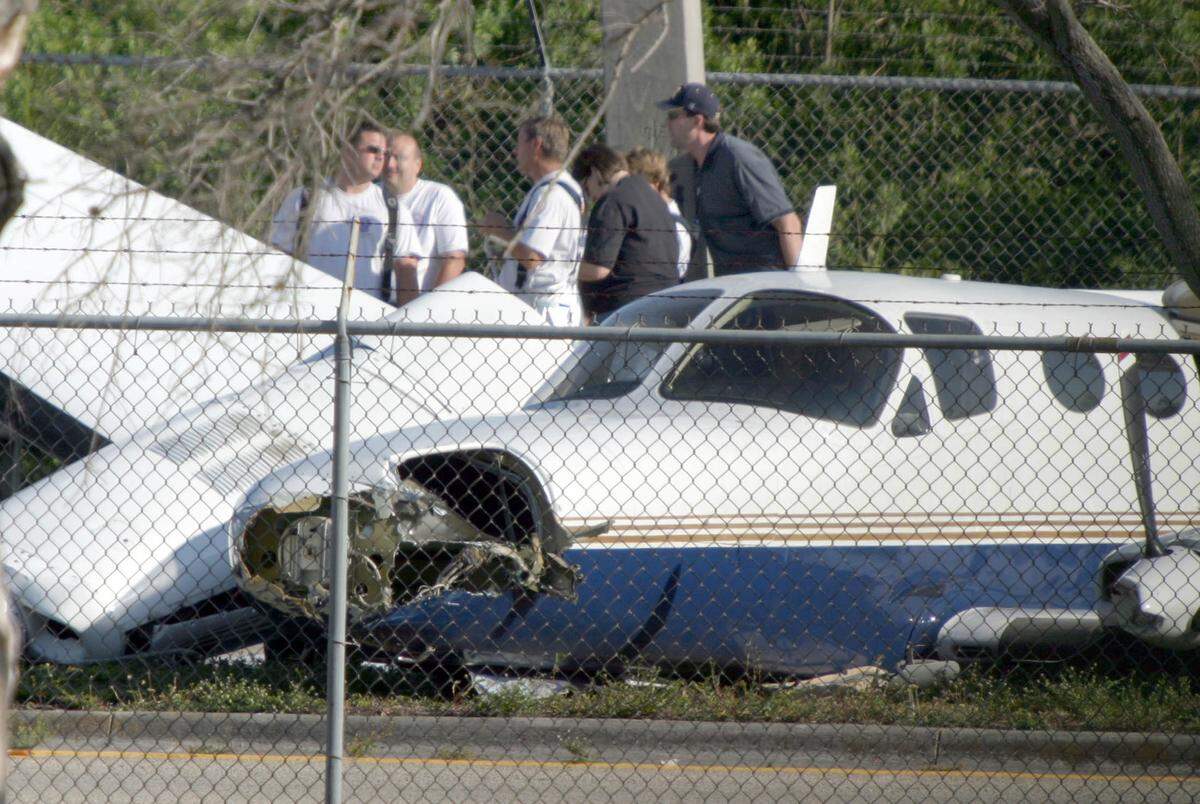 Two men escaped injury when engine troubles forced a crashed-landing of a twin-engine plane on Northwest 62nd Street just west of Fort Lauderdale’s Executive airport on May 12, 2006