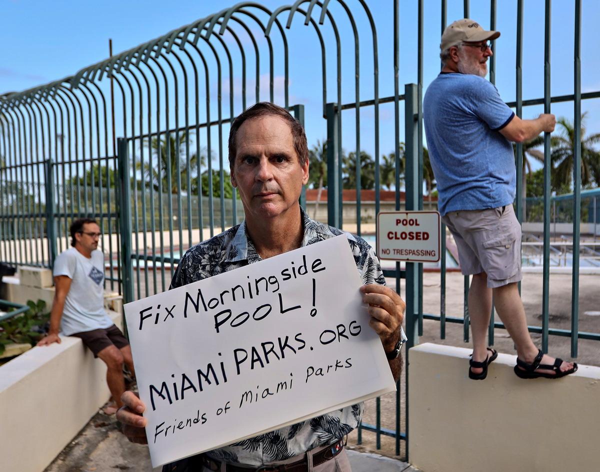 Elvis Cruz, a Morningside activist and resident, center, Andrew Sloan of Little Haiti, right, and David Radunsky of Liberty City, left, are frustrated that Morningside pool is closed for the fourth straight summer in this 2019 photo.