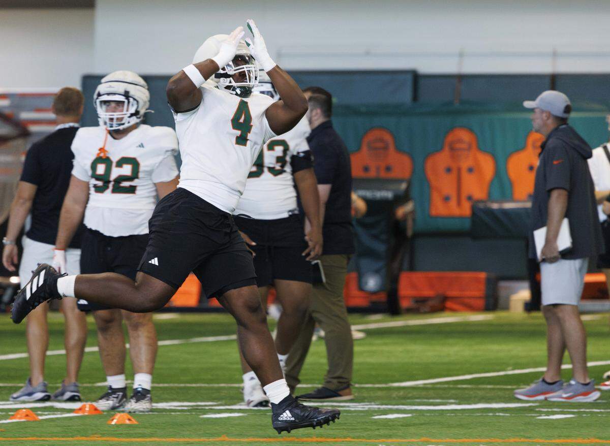 Defensive lineman Rueben Bain Jr. (4) does a dill during Miami Hurricanes football practice on Monday, Aug. 4, 2025, at University of Miami in Coral Gables, Fla. 