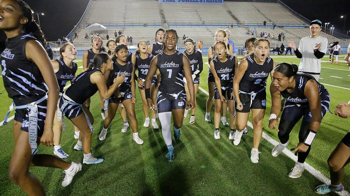 Miami Palmetto Panthers celebrate after winning the GMAC Girls Flag Football Championship game against Homestead Broncos on Friday, April 4, 2025 at Traz Powell Stadium in Miami. Andrew Uloza / for Miami Herald