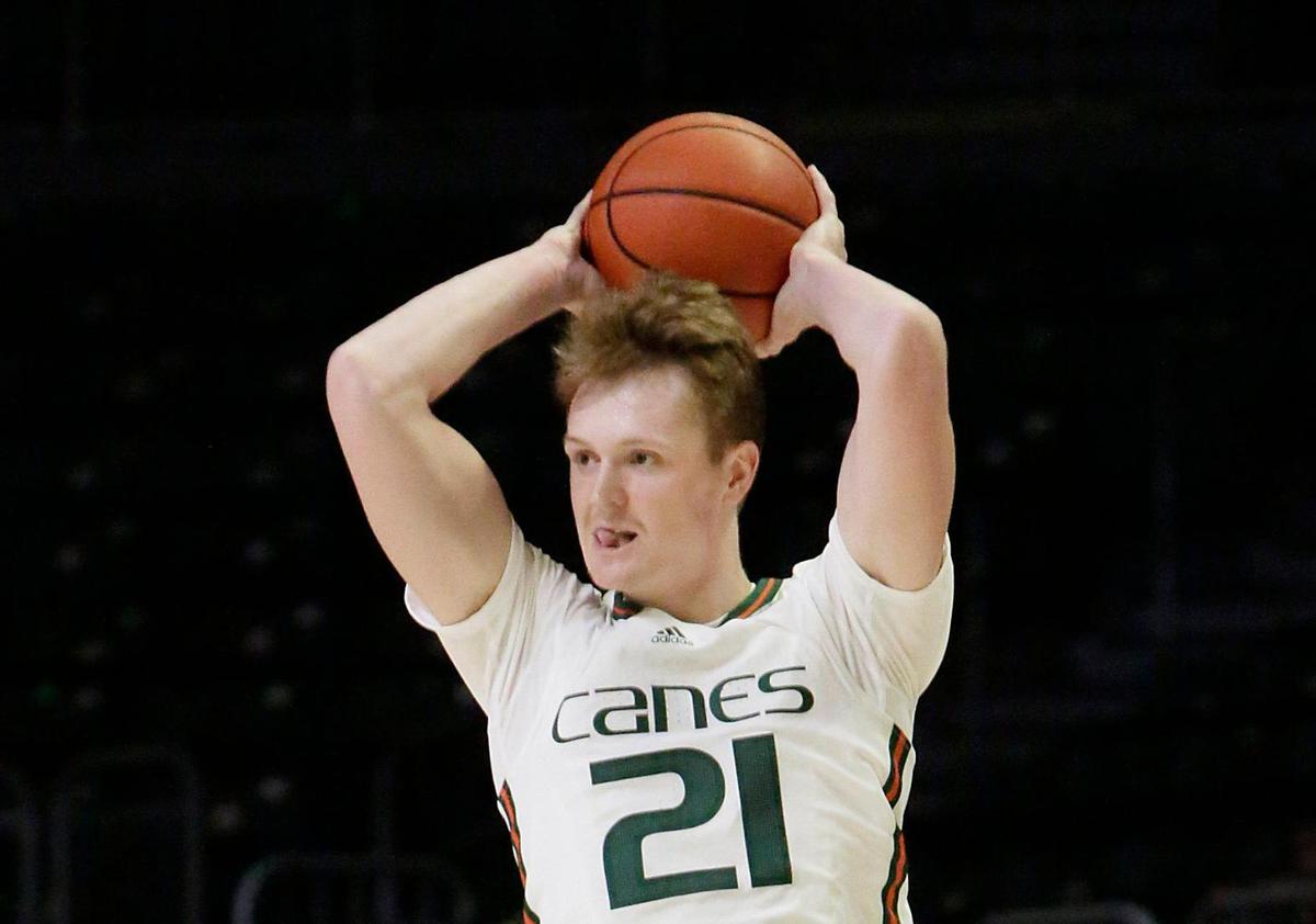 UM Hurricane Sam Waardenburg (21) looks to pass the ball while Hurricanes host Nova Southeastern Sharks on Wednesday, October 20, 2021 at Watsco Center in Coral Gables
