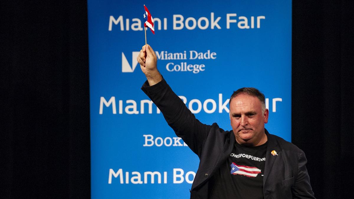 José Andrés waves a small Puerto Rican flag after attending a conversation with Republican commentator Ana Navarro at the Miami Dade College Wolfson Campus in Downtown Miami on Monday, September 24, 2018.