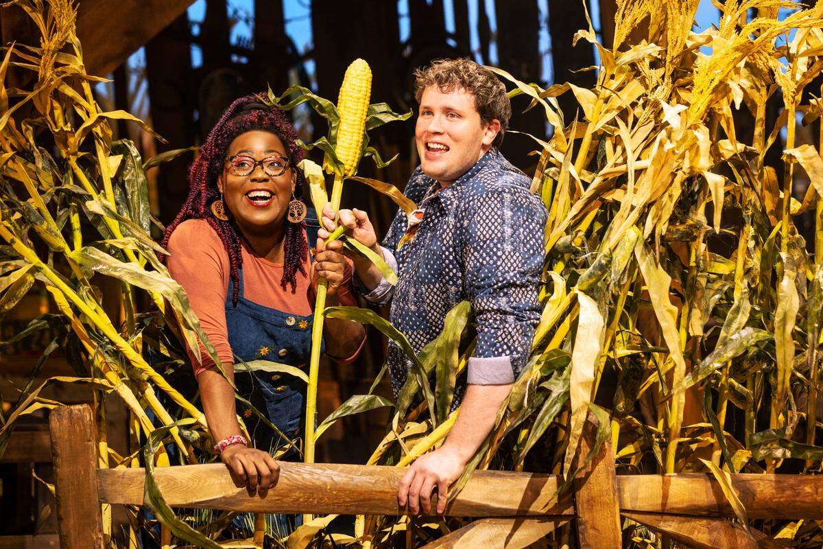 Ashley D. Kelley and Grey Henson perform in “Shucked,” a comedy musical.