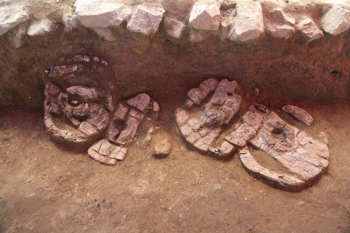 Wooden wheels found at the site.