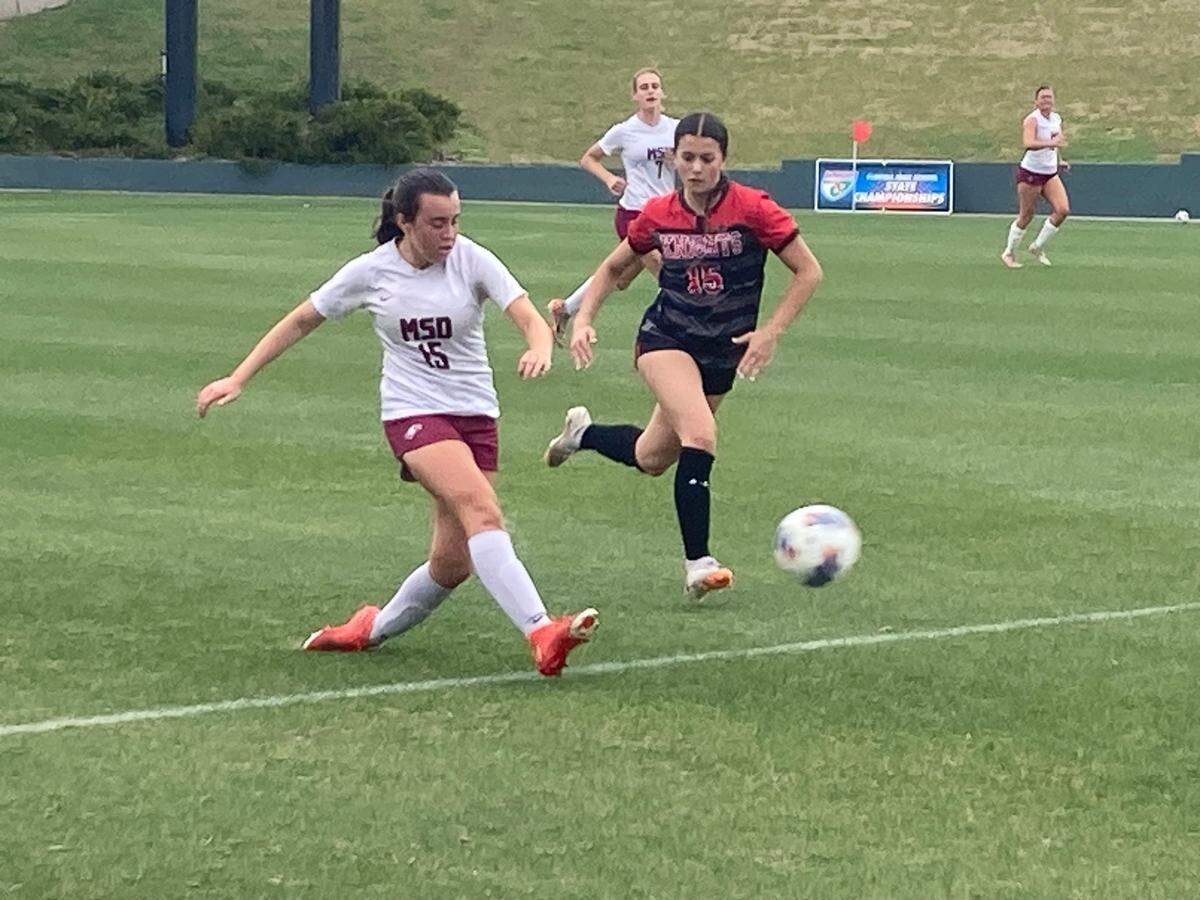 Stoneman Douglas’ Layla Segelnick drives past a Creekside defender during Thursday’s Class 7A state semifinal at Spec Martin Stadium in DeLand, Fla.