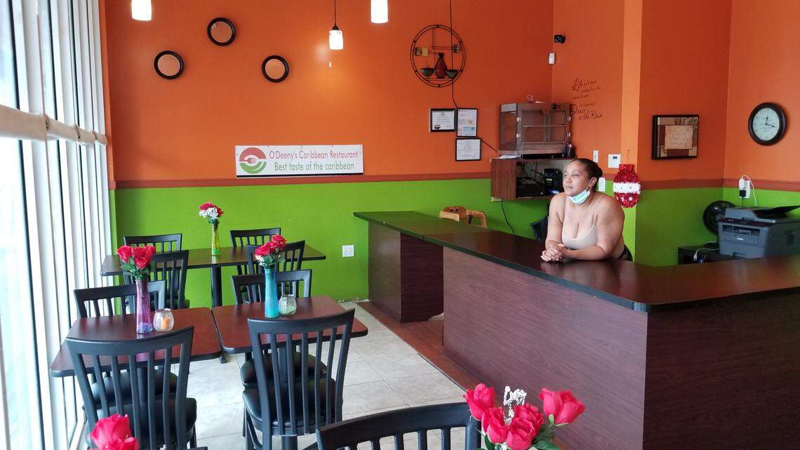 Orlendina Darcisse, the chef and owner of O’Deeny’s Caribbean Restaurant in Florida City, stands inside her empty eatery on July 15, 2020.