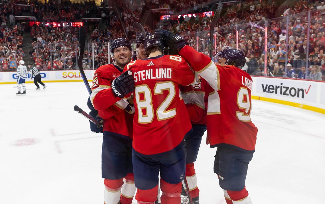 Florida Panthers center Kevin Stenlund (82) celebrates with his teammates after scoring a goal against the Toronto Maple Leafs in the first period of their NHL game at the Amerant Bank Arena on Thursday, Oct. 19, 2023, in Sunrise, Fla.