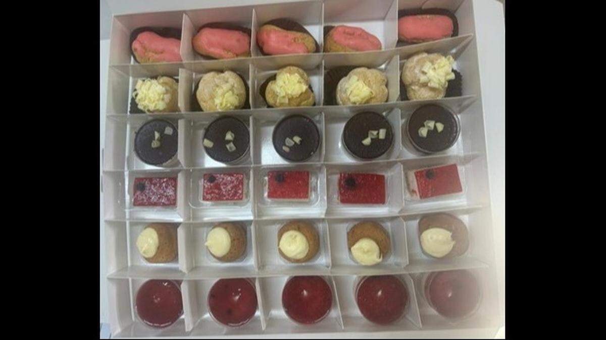 Sweet Cream Mini Pastries in, from the top row down, Pink Vanilla Eclair; Lemon Cream Puff; Mini Cup of Chocolate Ricotta and Pear; Strawberry Cheesecake; Lemon Cream Savare; and Wild Berry Mousse.