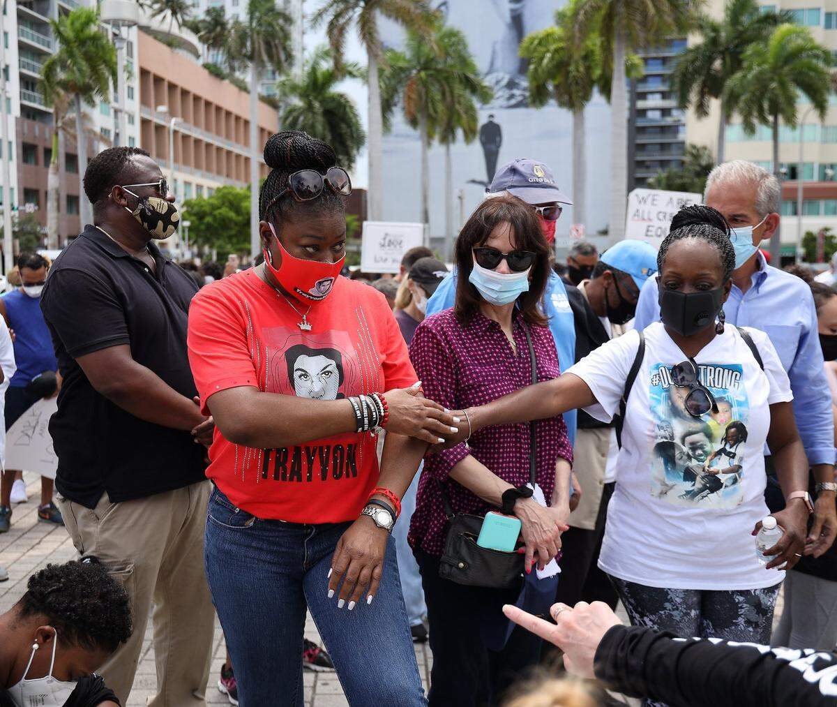 Sybrina Fulton, left, the mother of Trayvon Martin, at a downtown Miami rally against police brutality on June 14.