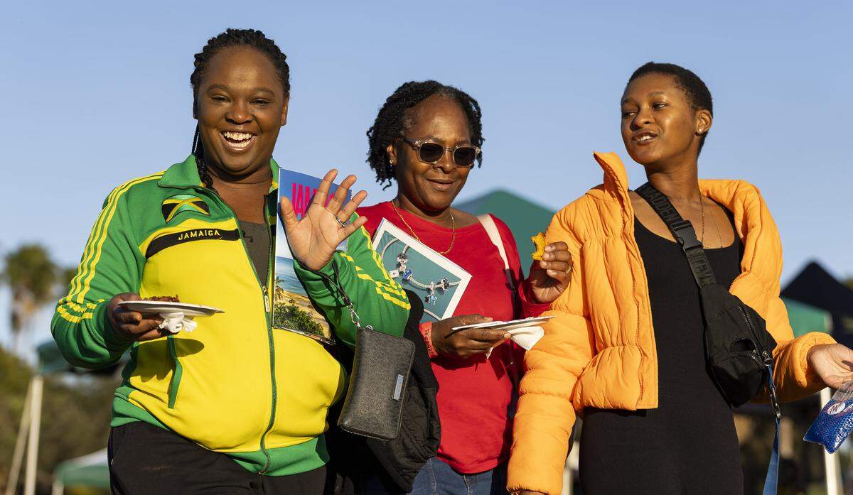 From left to right: Jessica Scott, Michelle Jones and Hanna Jones attend the Reggae Genealogy music festival.