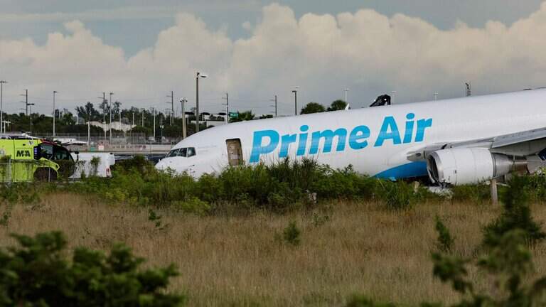 Five dead after an Amazon cargo plane veers off MIA runway and smashes into cars